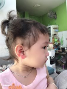 Xỏ lỗ tai cho bé tại nhà tại quận 8